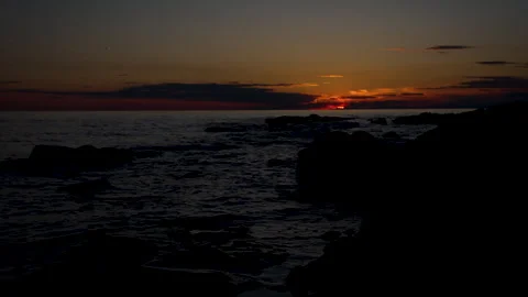 Sunset Glow Between Clouds and Sea Horizon Stock Footage 341877602