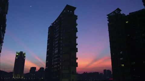 The sunset glow buildings Stock Footage 235268808