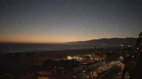 Sunset Glow Ocean Beach Mountain Traffic Stock Footage 49891085