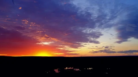 Sunset glow over the African bush near Victoria Falls 스톡 동영상 345521074
