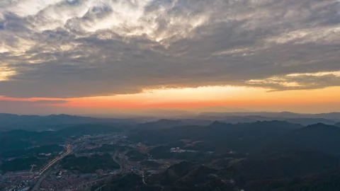 Sunset Glow over Mountains and Rivers Aerial Timelapse Video stock 320283749