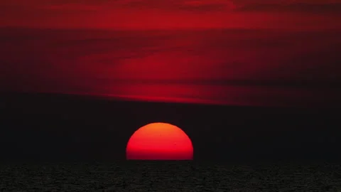 Sunset glow over the ocean horizon Stock Footage 329993243