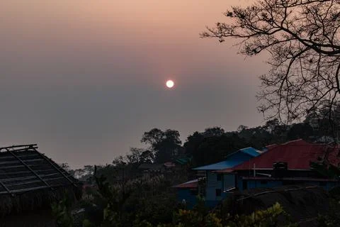 Sunset glow through Sajek's drifting clouds Stock Photos