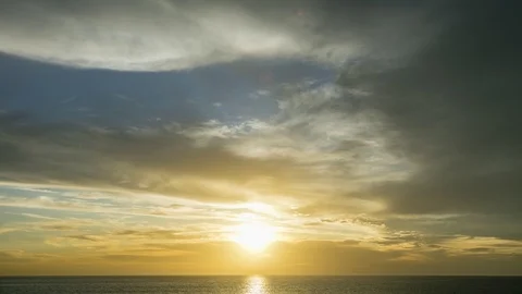 Sunset with glowing clouds and in the end with moon and stars 스톡 동영상 125491000