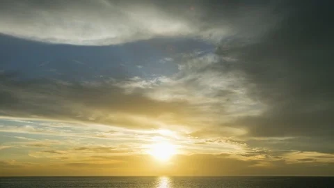 Sunset with glowing clouds and in the end with moon and stars Stock Footage 125491301