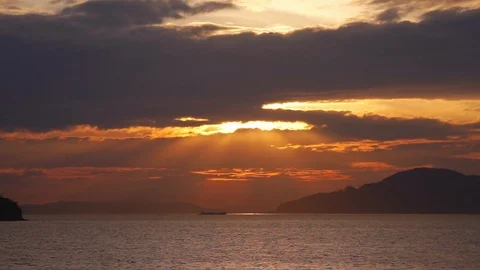 Sunset going  behind clouds Video stock 91435077