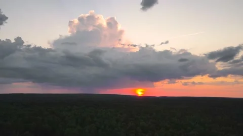 Sunset with golden light on a beautiful dark sky. Stock Footage 225836412