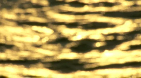 Sunset golden ocean slow-motion out of focus Stock Footage 2204287