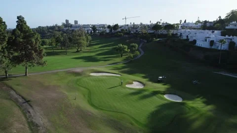 Sunset on the golf course. Luxurious area overlooking the golf club Stock Footage 234447545