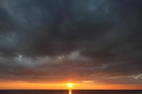 Sunset with great clouds Stock Photos