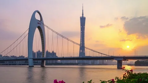 Sunset guangzhou canton tower bridge river bay flowers 4k timelapse china Video stock 83440477