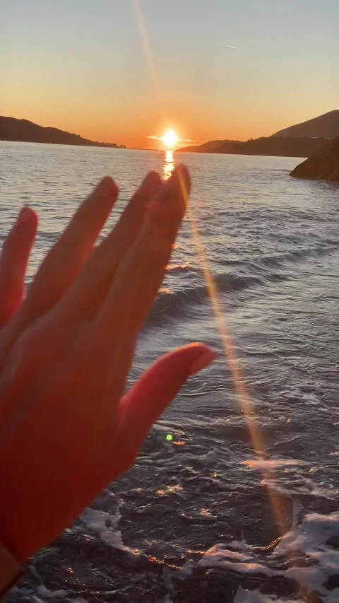 Sunset in the hands Stock Footage 234126536