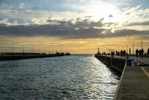 Sunset on the harbor Stock Photos