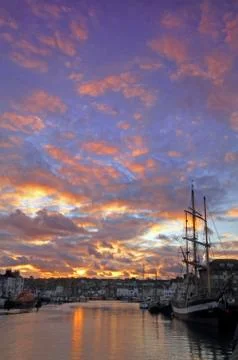Sunset at the harbour Stock Photos