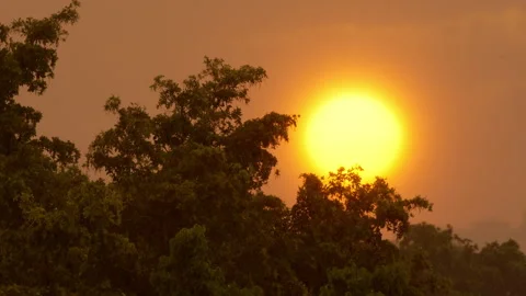 SUNSET IN HEAVY RAIN Stock-Footage 250361391