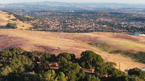 Sunset Helix Around Oak Tree With Power Lines and Town Beyond, Napa County Vídeo Stock 338227425