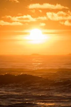 Sunset Hellst beach with lighthouse yellow red Norway Foto stock