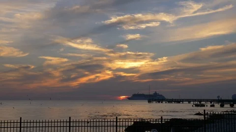 Sunset at Higgs beach Key West with Cruise ship leaving the port Stock Footage 107573252
