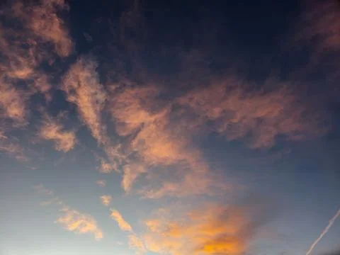 Sunset in the high Andes with many clouds Stock Photos