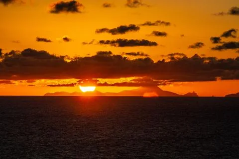 Sunset on the high seas Stockfoto's