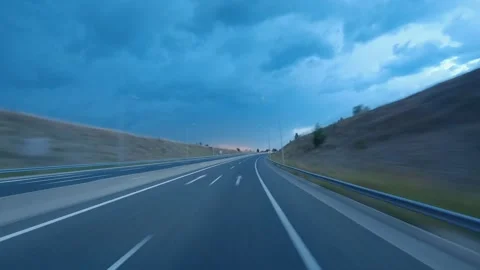 Sunset highway fast hyper lapse pov drive Vídeo Stock 325561698