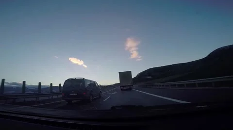 Sunset on highway Stockbeeldmateriaal 57304517