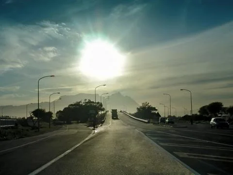 Sunset, highway road 库存照片