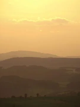 Sunset in the hills Stock Photos