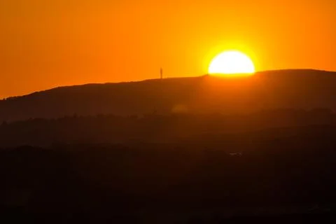 Sunset in the hills Stock Photos