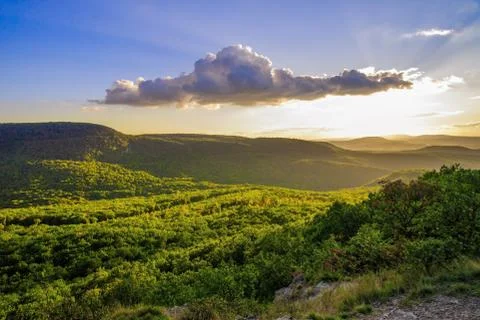 Sunset at the hillside Stock Photos