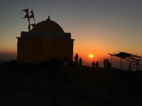 Sunset from a Hilltop with a temple silhouette Stock Photos