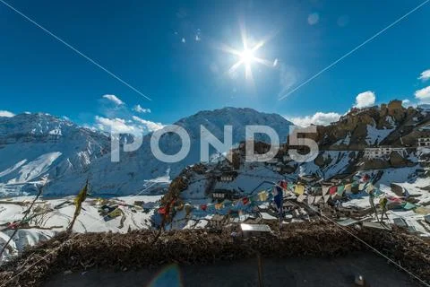 Sunset in Himalayan Village - Sun star burst in mountains Stock Photos