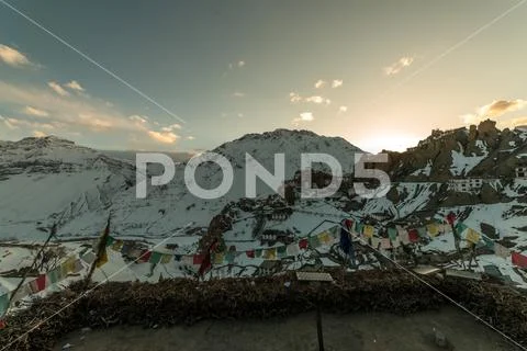 Sunset in Himalayan Village - Sun star burst in mountains Stock Photos