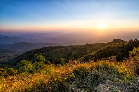 Sunset at horizon of sky Stock Photos
