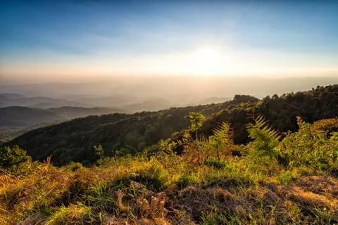 Sunset at horizon of sky Stock Photos