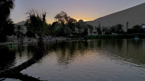 Sunset at Huacachina Oasis Stock Footage 119946867