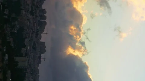 Sunset with huge cumuli clouds over the city Video stock 91154087