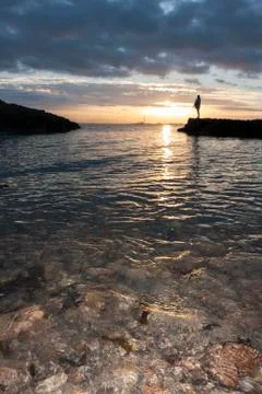 Sunset with human silhouette Stock Photos