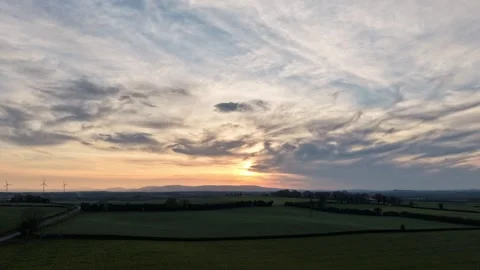 Sunset Hyperlapse Over Rural Fields and Dramatic Cloudy Sky Vídeos de archivo 333708217