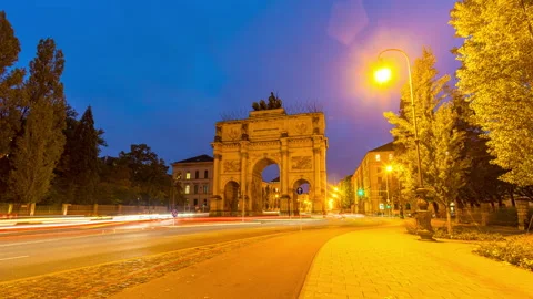 Sunset hyperlapse at The Siegestor Victory Arch in Munich City Bavaria with Stock Footage 222926518