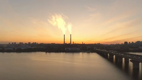 Sunset hyperlapse of smoking plant, bridge and river Stock Footage 116886633
