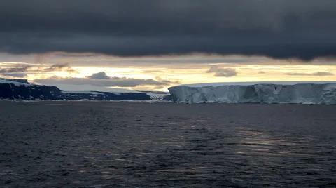 Sunset with Icebergs in Antarctica Stock Footage 922715