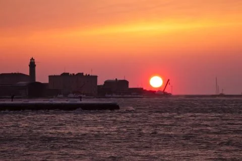 Sunset on the icy doks of trieste Stock Photos