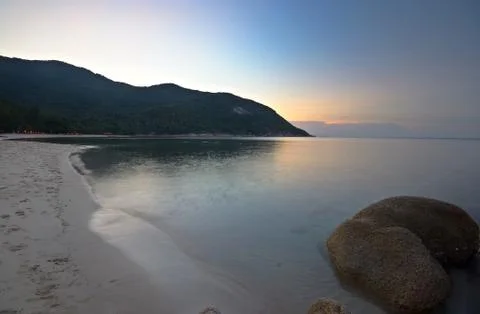 Sunset on idyllic tropical beach Stock Photos