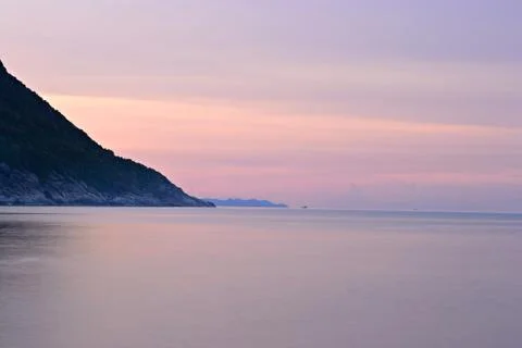 Sunset on idyllic tropical beach Stock Photos