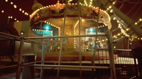 Sunset illuminates intricate amusement park attractions beautifully Vídeo Stock 339793335