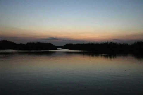 Sunset illuminations in the wetlands Stock Photos