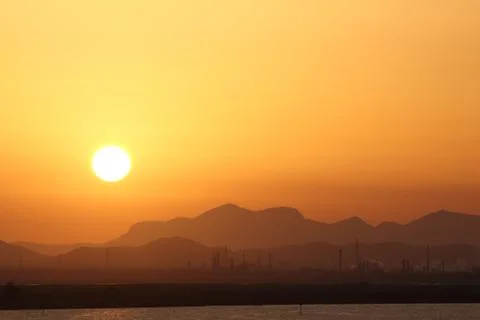 Sunset in industrial zone Stock Photos
