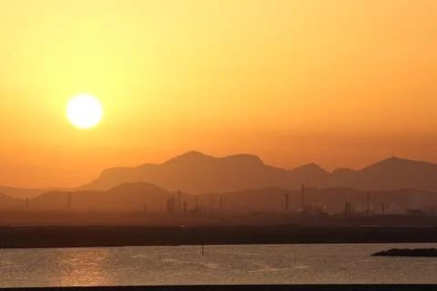 Sunset in industrial zone Stock Photos