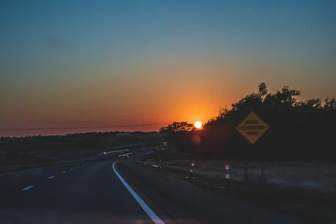 Sunset on Interstate 40 Texas U.S.A. after sunset point of view 写真素材